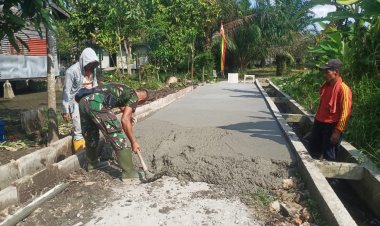 Satgas TMMD dan Warga Gotong royong Selesaikan Sasaran Fisik Semenisasi 