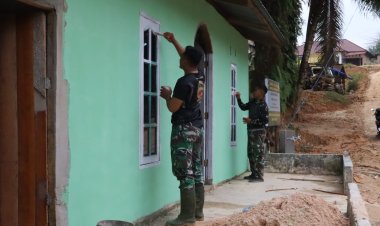 Satgas TMMD Ke-127 Kodim 0301/Pekanbaru Laksanakan Pengecatan Posyandu Kasih Ibu di Tenayan Raya