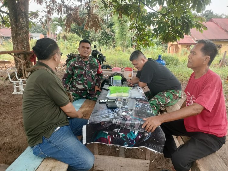 Sela Waktu, Tumbuh Keakraban: Satgas TMMD dan Warga Sialang Sakti Bersua